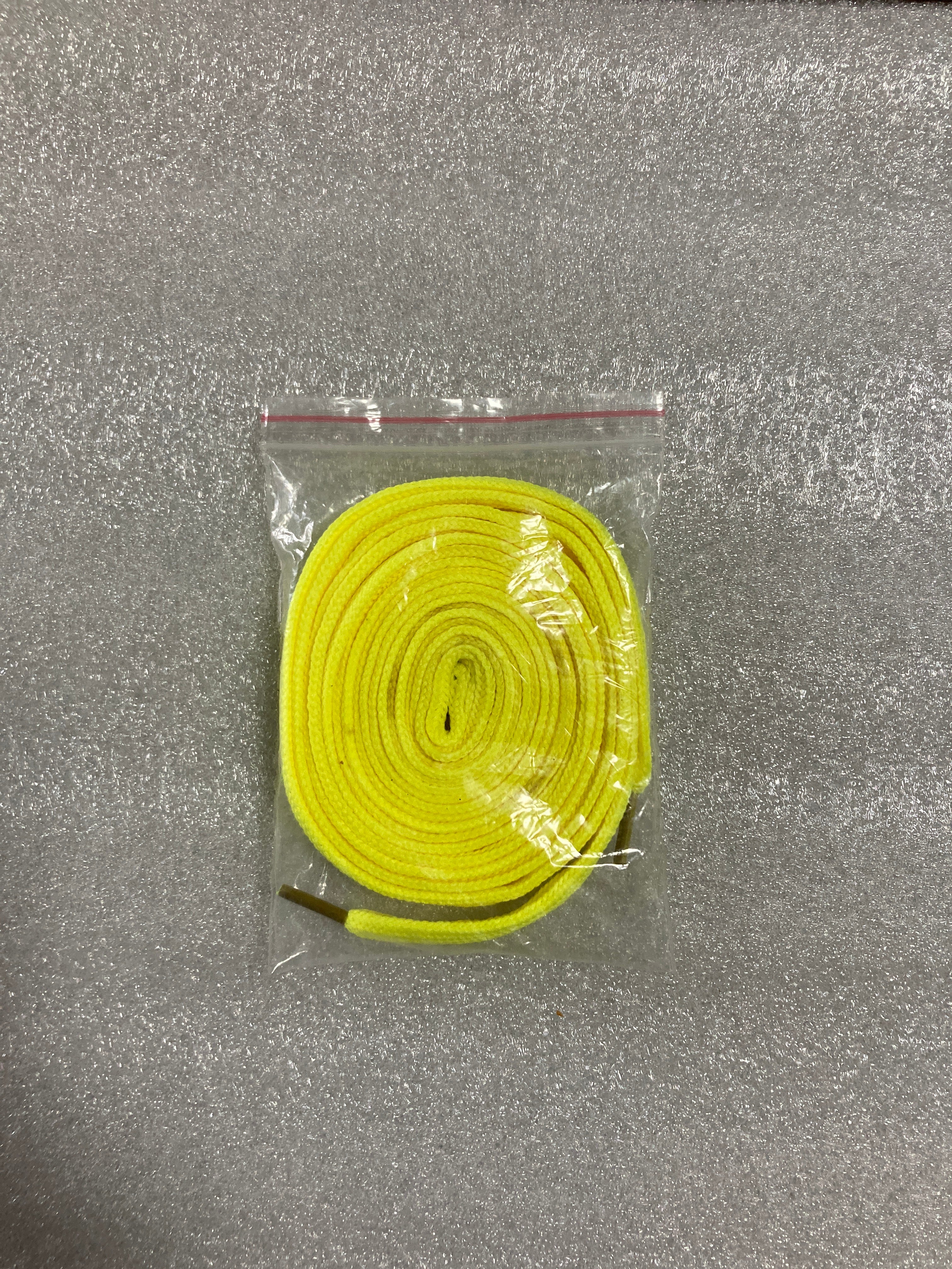 Nike shoes with light yellow shoelaces $1
